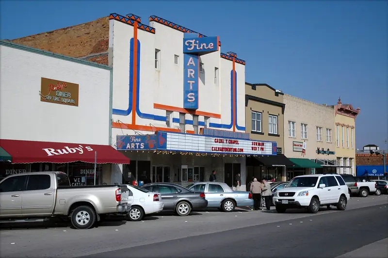 Fine Arts Theatre and shops on the historic Denton square
