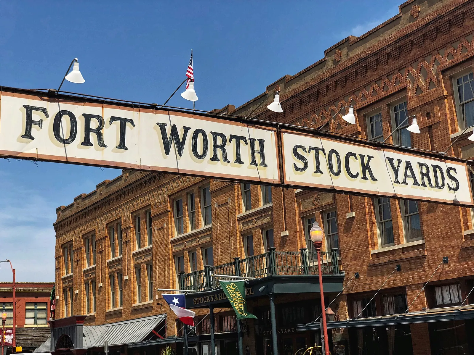 Fort Worth Stock Yards sign over Exchange Avenue in the Fort Worth Stockyards
